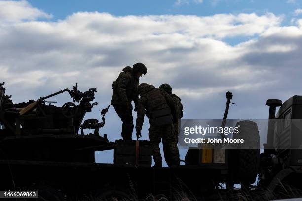Ukrainian soldiers man an anti-aircraft gun on February 14, 2023 near Bakhmut, Ukraine. Ukrainian forces have been holding the city as Russian Wagner...