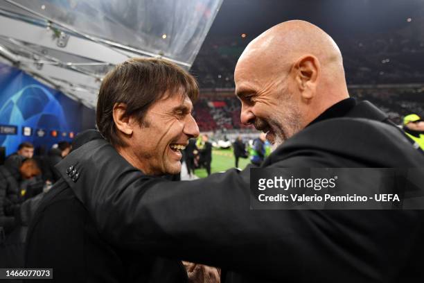 Antonio Conte , Manager of Tottenham Hotspur, greets Stefano Pioli, Head Coach of AC Milan, prior to the UEFA Champions League round of 16 leg one...