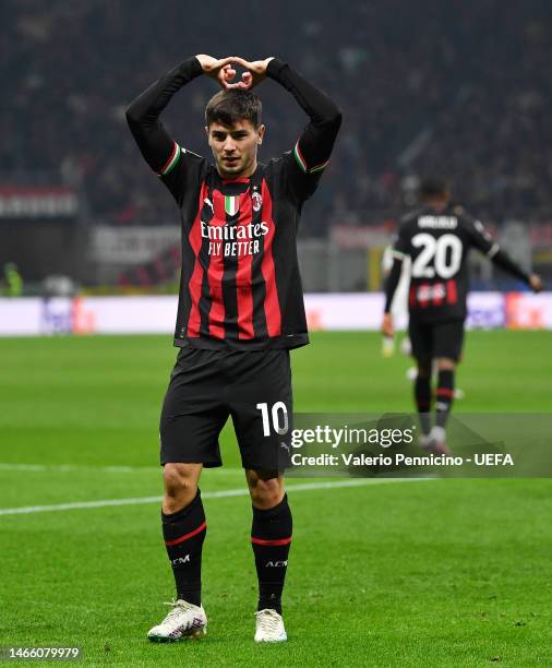 Brahim Diaz of AC Milan celebrates after scoring the team's first goal during the UEFA Champions League round of 16 leg one match between AC Milan...