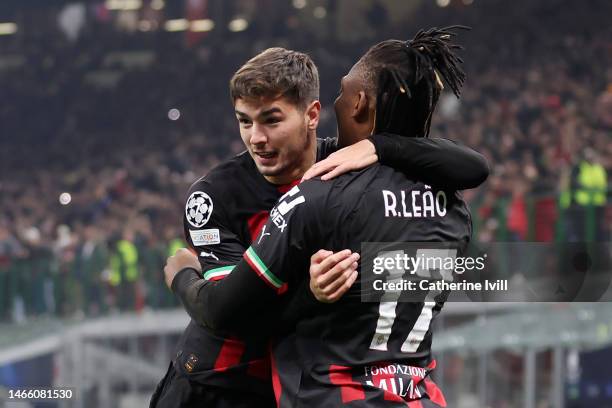 Brahim Diaz of AC Milan celebrates with teammate Rafael Leao after scoring the team's first goal during the UEFA Champions League round of 16 leg one...