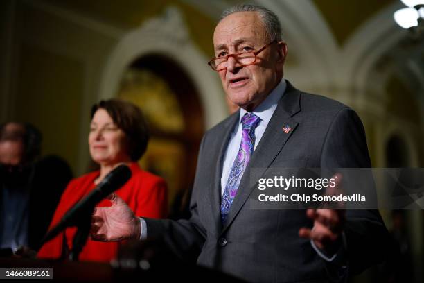 Senate Majority Leader Charles Schumer talks with reporters following the weekly Senate Democratic policy luncheon at the U.S. Capitol on February...