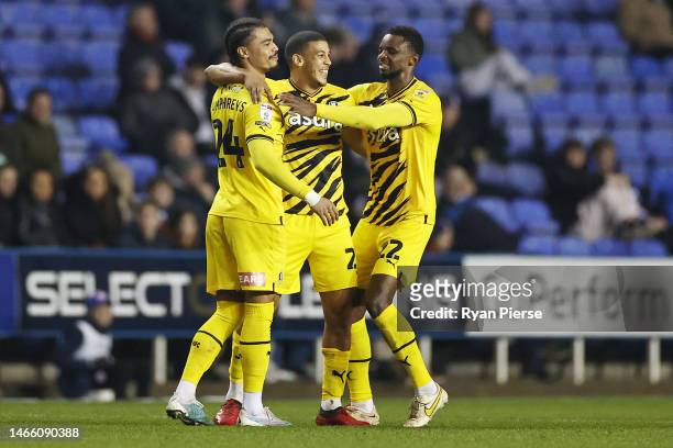 Lee Peltier of Rotherham United celebrates with teammates after scoring the team's first goal during the Sky Bet Championship match between Reading...