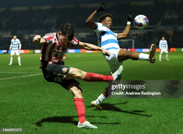 Luke O'Nien of Sunderland clears the ball whilst under pressure from Macauley Bonne of Queens Park Rangers during the Sky Bet Championship match...