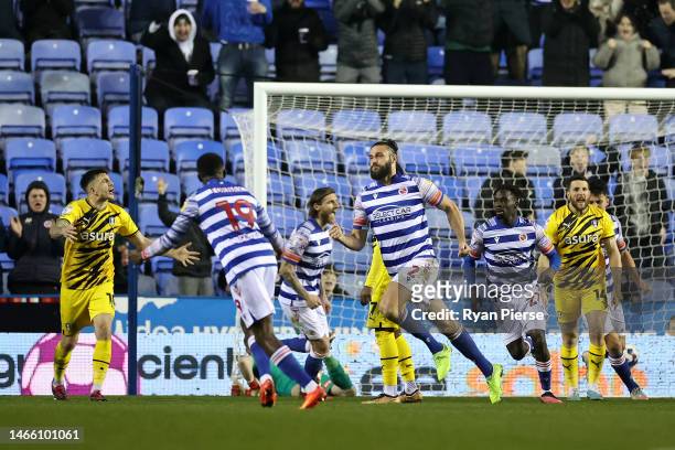 Andy Carroll of Reading celebrates with teammates after scoring the team's first goal during the Sky Bet Championship match between Reading and...