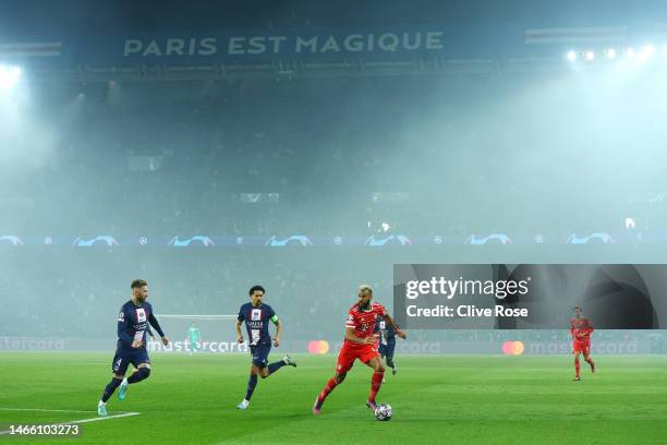 General view as Eric Maxim Choupo-Moting of FC Bayern Munich runs with the ball during the UEFA Champions League round of 16 leg one match between...