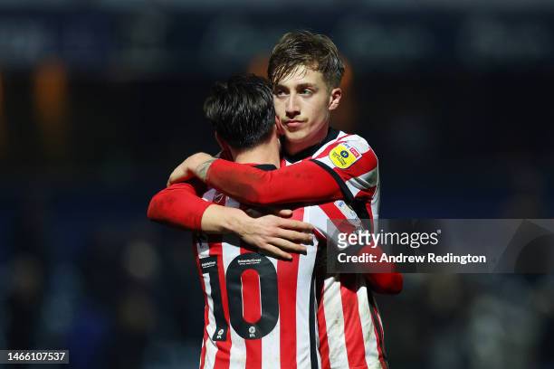 Patrick Roberts of Sunderland and Jack Clarke of Sunderland celebrate following the Sky Bet Championship match between Queens Park Rangers and...