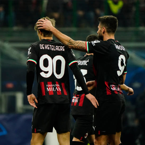 Olivier Giroud of AC Milan consoles his teammate Charles De Ketelaere of AC Milan during the UEFA Champions League round of 16 leg one match between...