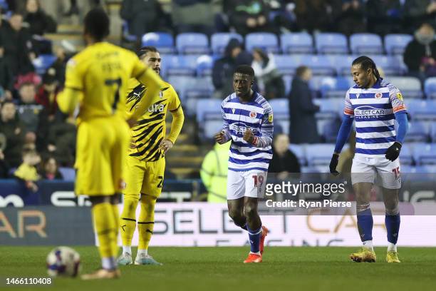 Tyrese Fornah of Reading celebrates after scoring the team's second goal as players of Rotherham United look dejected during the Sky Bet Championship...