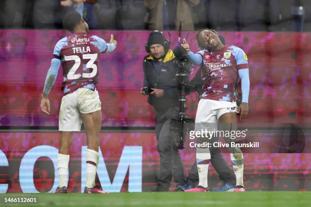 Michael Obafemi of Burnley celebrates with teammate Nathan Tella after scoring the team's first goal during the Sky Bet Championship match between...
