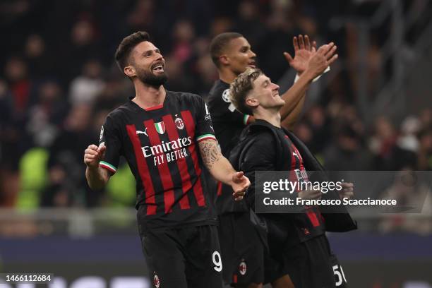 Olivier Giroud of AC Milan and his teammates celebrate after winning the UEFA Champions League round of 16 leg one match between AC Milan and...