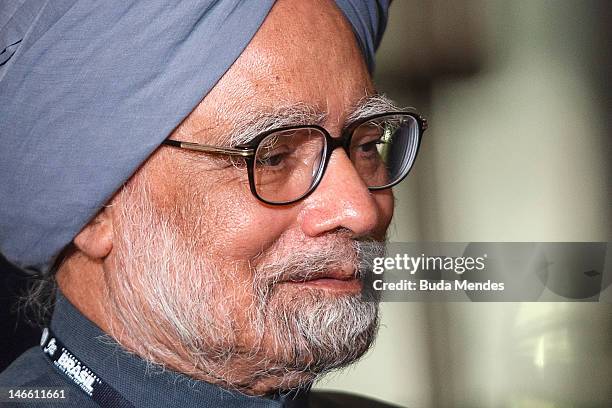 India's Prime Minister Manmohan Singh pose during the UN Conference on Sustainable Development Rio+20 family photo, on June 20, 2012 in Rio de...