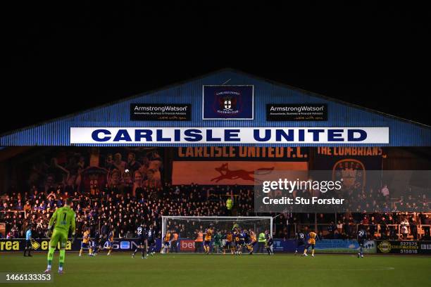 General view of the action as the Carlisle fans housed in the south stand, watch the action during the Sky Bet League Two between Carlisle United and...