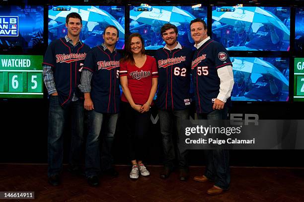 Minnesota Twins Joe Mauer, Brian Duensing, Liam Hendriks and Matt Capps pose with Cave Dweller Lindsay Guentzel during their visit to the MLB Fan...