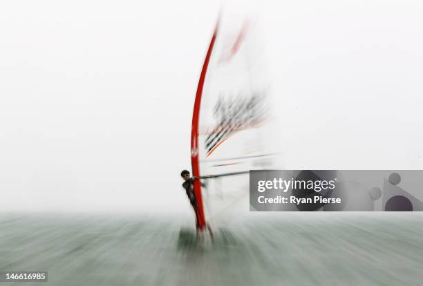 Kwan Ching Ma of Hong Kong China races during the Windsurfing Women's T293 race on Day 5 of the 3rd Asian Beach Games Haiyang 2012 on June 21, 2012...