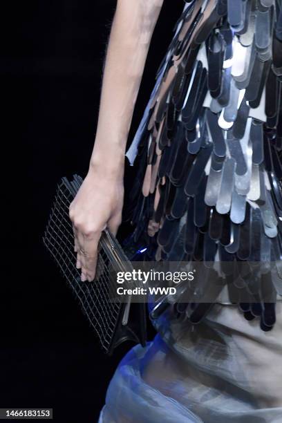 Model on the catwalk, bag detail