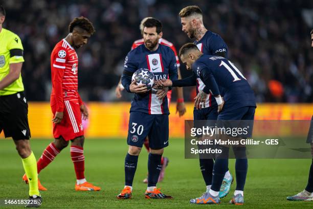 Lionel Messi, Sergio Ramos, and Neymar of Paris prepare a freekick during the UEFA Champions League round of 16 leg one match between Paris...
