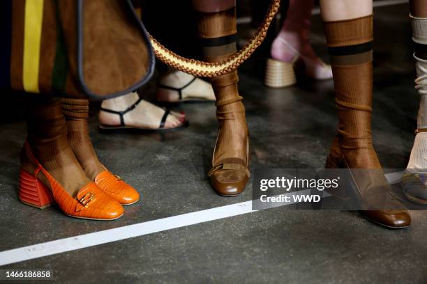 Model backstage, shoe detail