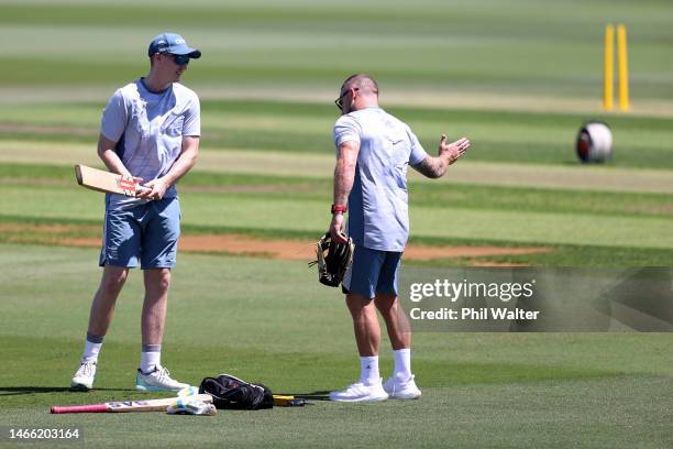 Harry Brook talks with coach Brendon McCullum during an England Test squad training session at Bay Oval on February 15, 2023 in Mount Maunganui, New...