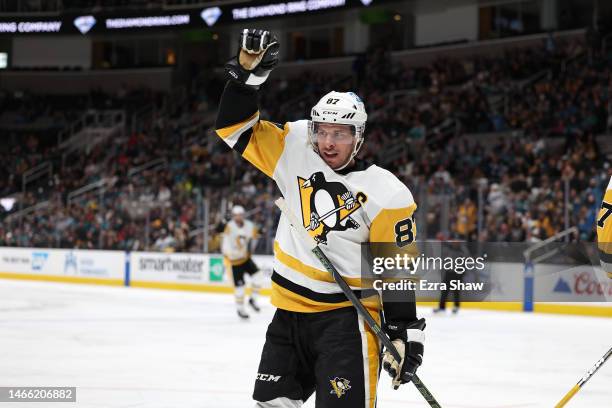 Sidney Crosby of the Pittsburgh Penguins celebrates after Rickard Rakell scored a goal against the San Jose Sharks in the first period at SAP Center...