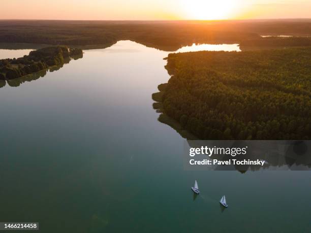 sunset over wdzydze lake in the kashubia (kaszuby) region in pomeranian province (pomorskie), poland, 2020 - pomorskie province stockfoto's en -beelden