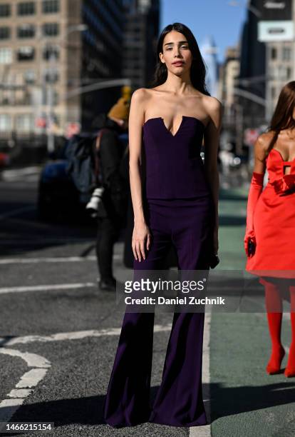 Actress Zion Moreno is seen wearing a purple Pamella Roland top and pants outside the Pamella Roland show during New York Fashion Week F/W 2023 on...
