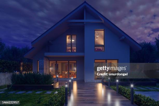 modern villa exterior at night - build path stockfoto's en -beelden