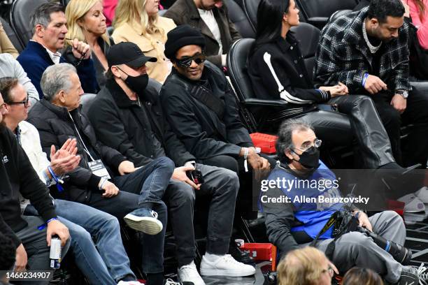 Leonardo DiCaprio and rapper Q-Tip attend a basketball game between the Los Angeles Clippers and the Golden State Warriors at Crypto.com Arena on...