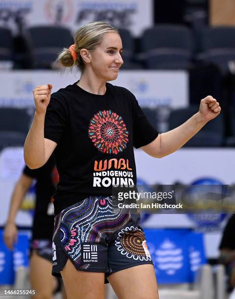 Courtney Woods of the Fire warms up before the start of the round 14 WNBL match between Townsville Fire and Melbourne Boomers at Townsville...
