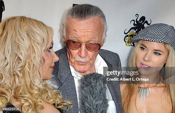 Actress Diana Terranova, comic book icon Stan Lee and actress Paula Labaredas arrives for POW! Entertainment and 1821 Comics charity auction benefit...