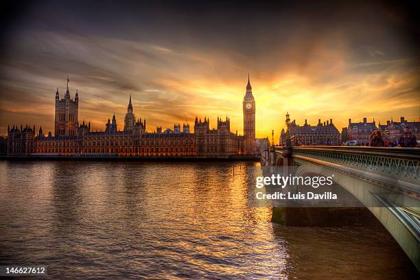 big ben and houses of parliament - the state opening of parliament in london stockfoto's en -beelden