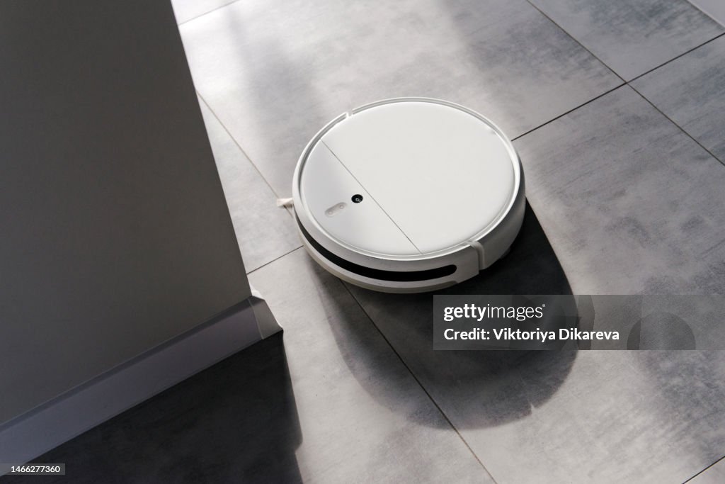 High Angle View Of Robotic Vacuum Cleaner