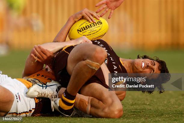 Max Ramsden of the Hawks hurts his ankle whilst being tackled by Josh Weddle of the Hawks during the Hawthorn Hawks AFL intra club match at La Trobe...