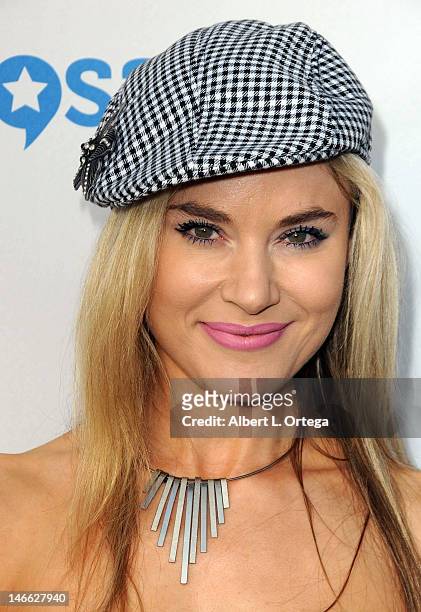 Actress Paula Labaredas arrives for POW! Entertainment and 1821 Comics charity auction benefit for The John Wayne Cancer Institute with The Guiness...
