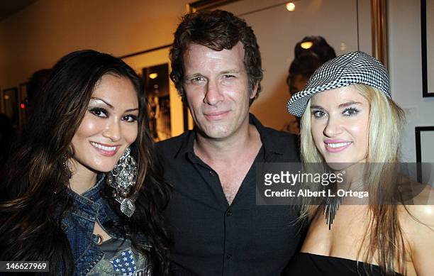 Actress Mary Christina Brown, actor actor Thomas Jane and actress Paula Labaredas arrive for POW! Entertainment and 1821 Comics charity auction...