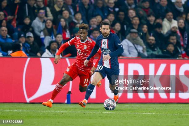 Lionel Messi of Paris Saint-Germain controls the ball against Kingsley Coman of FC Bayern Munchen during the UEFA Champions League round of 16 leg...