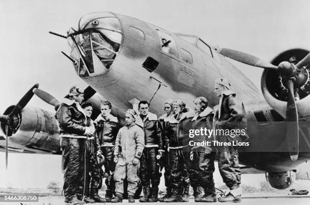 Captain William "Bill Musselwhite briefs the crew of Peggy Don, a Boeing B-17E Flying Fortress four engined bomber from the 342nd Bombardment...