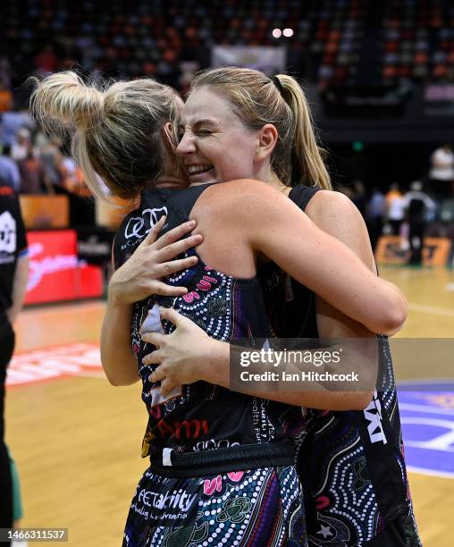 Lauren Nicholson and Karlie Samuelson of the Fire celebrate after winning during the round 14 WNBL match between Townsville Fire and Melbourne...