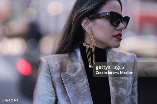 Lenia Perez seen wearing gold velvet Tom Ford blazer, black Norma kamali jumpsuit, gold VIPOP Earring and rig, gold Rolex watch during New York...