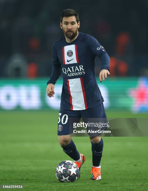 Lionel Messi of Paris Saint-Germain controls the ball during the UEFA Champions League round of 16 leg one match between Paris Saint-Germain and FC...