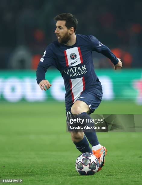 Lionel Messi of Paris Saint-Germain controls the ball during the UEFA Champions League round of 16 leg one match between Paris Saint-Germain and FC...