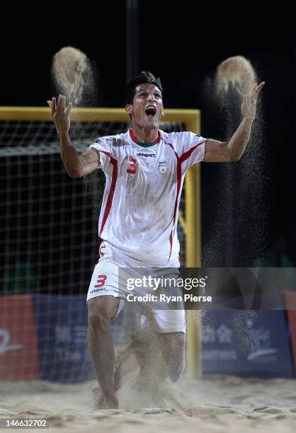 Hassan Mobarhan Abdollahi of Iran celebrates victory during the Beach Soccer Men's Gold Medal Match between Iran and China on Day 5 of the 3rd Asian...