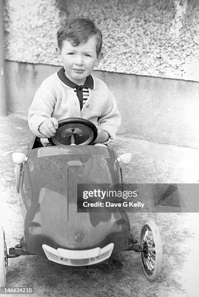 portrait of boy in toy sports car - 20th century model car stock pictures, royalty-free photos & images