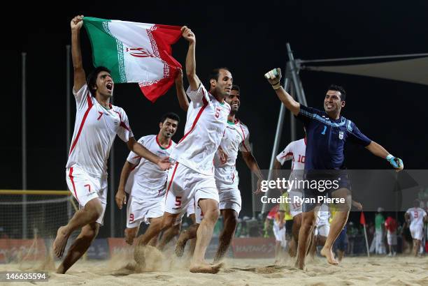 Iran celebrates victory during the Beach Soccer Men's Gold Medal Match between Iran and China on Day 5 of the 3rd Asian Beach Games Haiyang 2012 at...