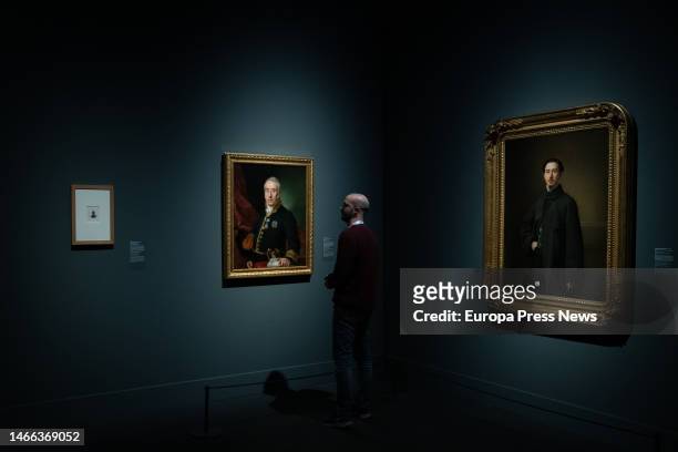 Person observes one of the works during the presentation of the exhibition 'El siglo del retrato. Collections from the Prado Museum', at Caixaforum...