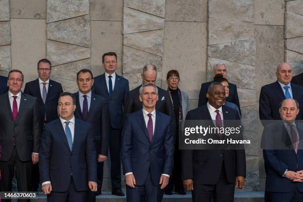 Defence ministers and senior NATO officials pose for the official press photo on the second day of the NATO defence ministers' meeting on February...