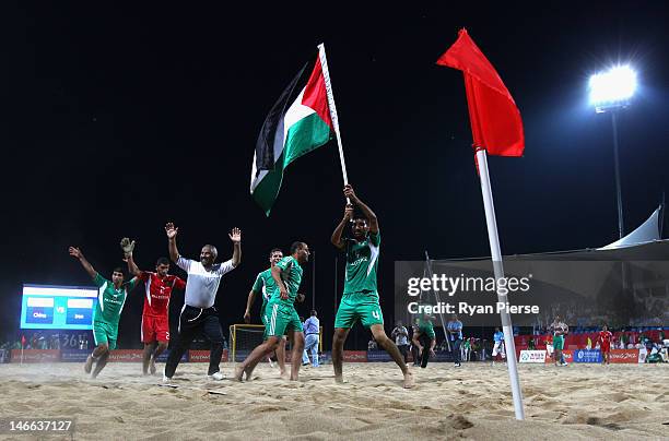 Palestine celebrate victory after the Beach Soccer Men's Bronze Medal Match between Palestine and Lebanon on Day 5 of the 3rd Asian Beach Games...