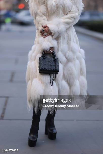 Corina Mihaila Larpin seen wearing Alexander McQueen white fur long coat, black leather leggings, YSL black leather plateau / platform heels / boots,...