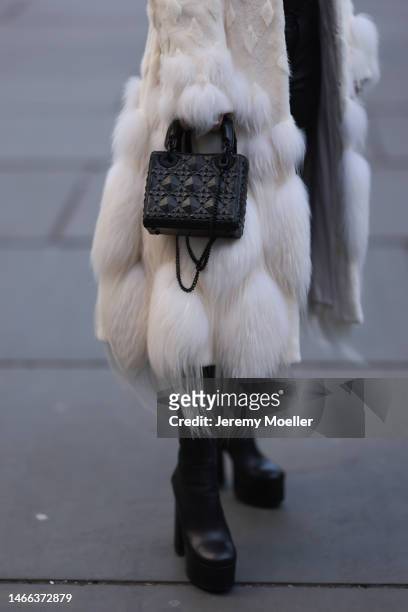 Corina Mihaila Larpin seen wearing Alexander McQueen white fur long coat, black leather leggings, YSL black leather plateau / platform heels / boots,...