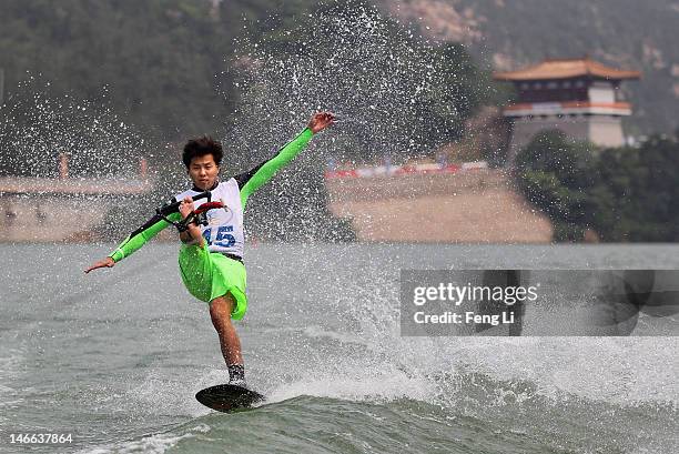 Cho Beomgeun of South Korea competes in the Waterski Men's Tricks preliminaries on Day 5 of the 3rd Asian Beach Games Haiyang 2012 at Jiulong Lake on...