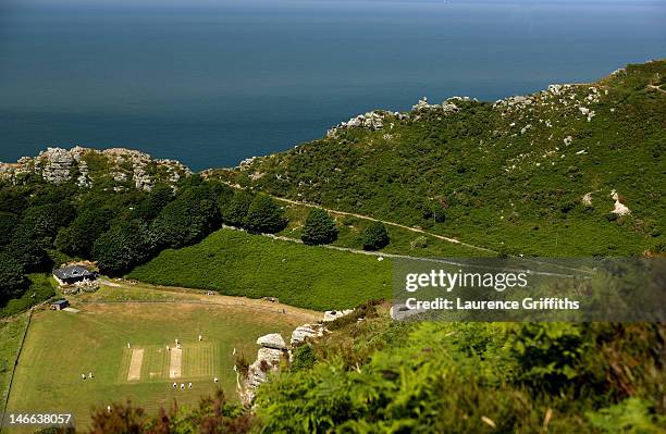 Cricketers from Lynton and Lynmouth Cricket Club play in the "Valley of The Rocks" on June 26, 2005 in Lynton and Lynmouth, England.